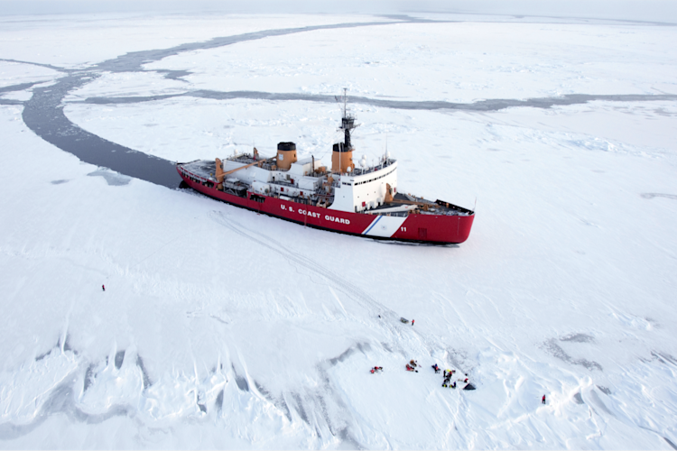 A ship traveling through water image.